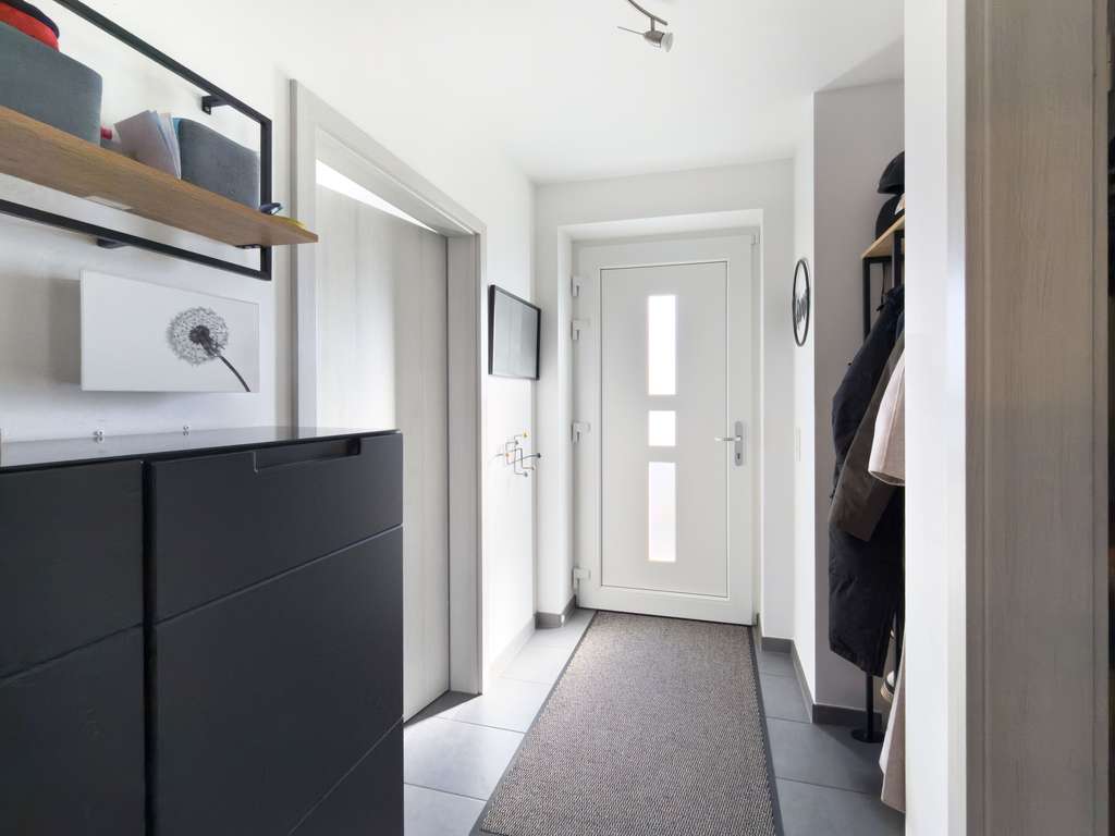 Immobilie in Bönningstedt - Rarität in Bönningstedt: Neuwertige Doppelhaushälfte in Feldrandlage - Bild 2