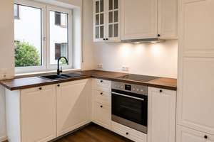Moderne 2-Zimmer-Gartenwohnung mit Terrasse, Einbauküche & TG-Stellplatz in Bestlage von Ebersberg – Sieghartstraße 16, 85560 Ebersberg – Vorschaubild 8
