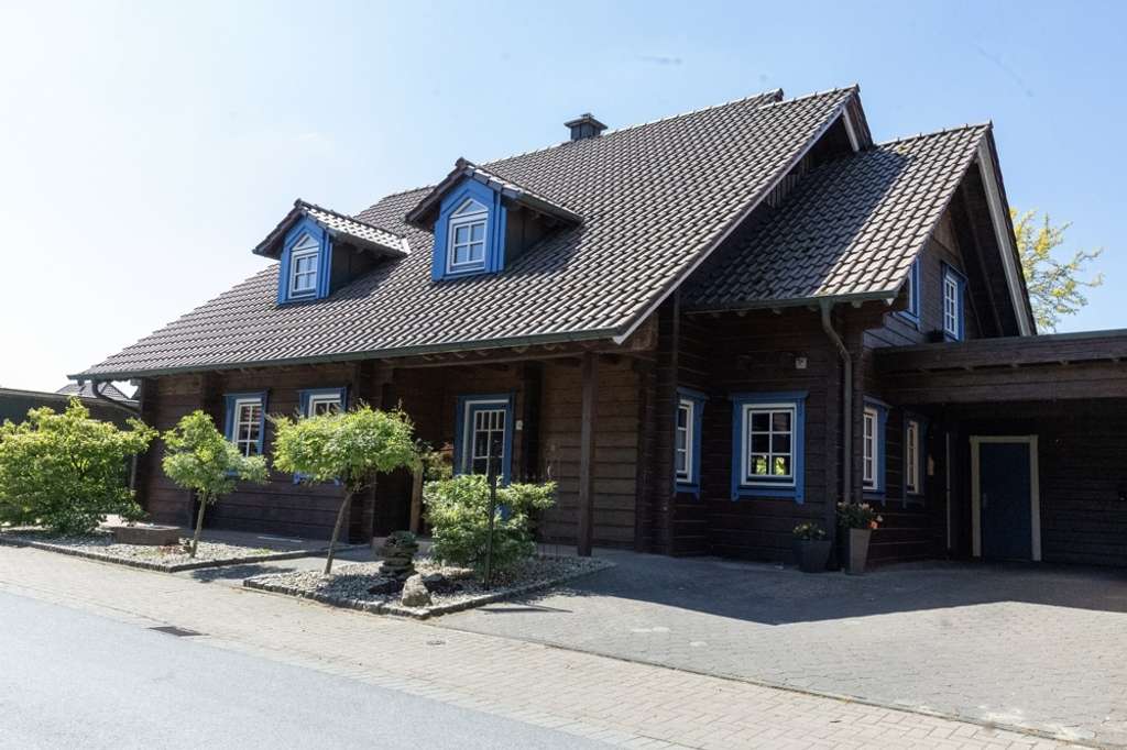 Immobilie in Ahaus - Schönes Leben in Holz und Licht – Blockhaus mit Garten in ruhiger Lage - Bild 0