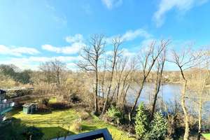 Erstbezug nach Sanierung - 2-Zimmer-Wohnung mit Balkon und See Blick und Tiefgaragen Stellplatz