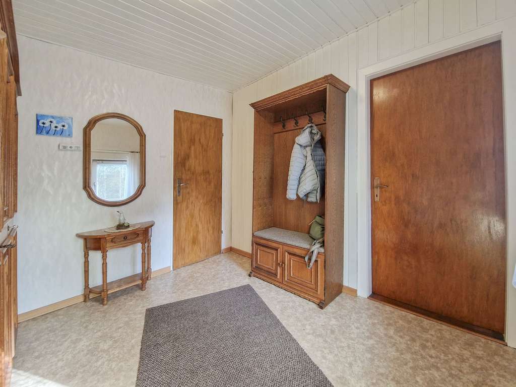 Immobilie in Münsterdorf - Großes Eckgrundstück mit rund 1.000 m², EFH und Option auf Neubebauung - Bild 1