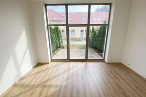 Wohnen mit Reihenhauscharakter! Schickes 1- Zimmerappartment+Stellplatz+Terrasse+Fußbodenheizung!