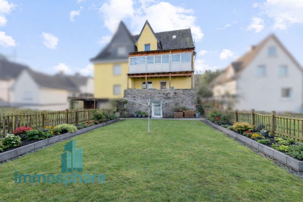 Immobilie in Kreuztal - Mehr als Wohnen: Doppelhaushälfte mit 3 separaten Einheiten - Bild 1