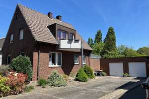 Nähe Dortmund-Ems-Kanal, gepflegtes Zweiparteienhaus mit 762 m² Grundstück und zwei Garagen – Münster – Vorschaubild 1