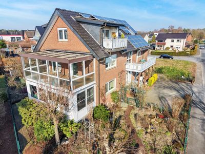 Charmante 3-Zimmer Erdgeschosswohnung mit eigenem Garten, Wintergarten, Terrasse und Garage