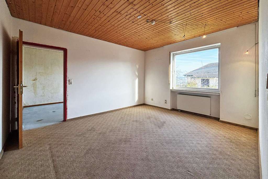 Immobilie in Newel - sanierungsbedürftiges Einfamilienhaus in Butzweiler mit ca. 146 m² Wohnfläche + Garage + Garten! - Bild 2