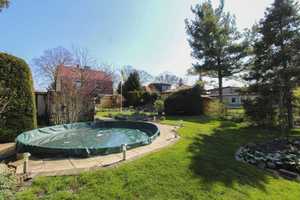 Sofort wohlfühlen: EFH mit Urlaubsfeeling dank großzügigem Garten, Pool und Garage in Brieselang – Havelland (Kreis) – Vorschaubild 2