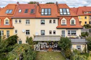 Reihenmittelhaus mit klarer Raumstruktur und Gartenidylle