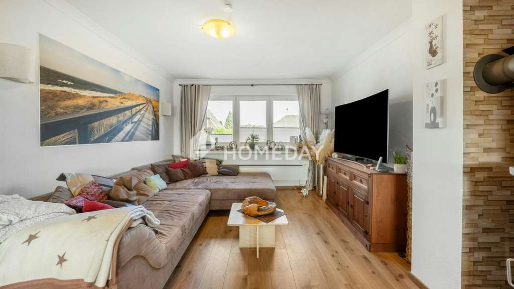 Immobilie in Lastrup - Stilvoll modernisiertes Einfamilienhaus mit großzügigem Garten, Terrassen und Solaranlage - Bild 2