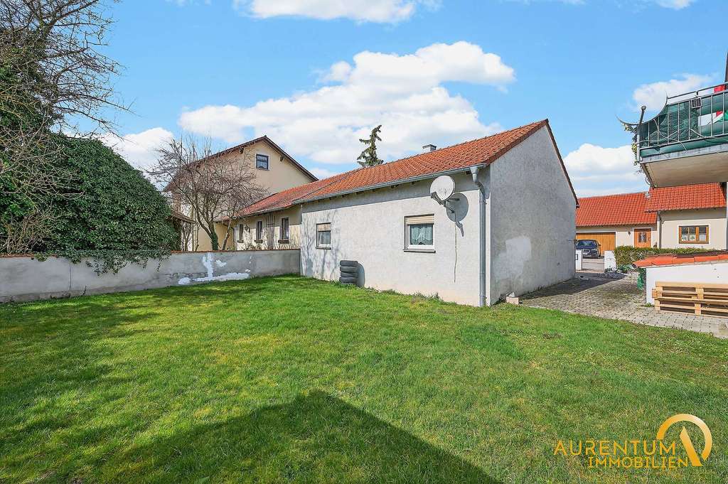 Immobilie in Biburg - Flexibles Zweifamilienhaus mit großem Grundstück und Nebengebäude in ruhiger Lage von Biburg - Bild 4