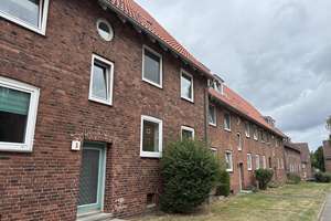 Erdgeschosswohnung mit Balkon