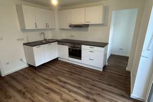 Großzügiges 1-Zimmer-Apartment im Erdgeschoss mit Balkon und Einbauküche