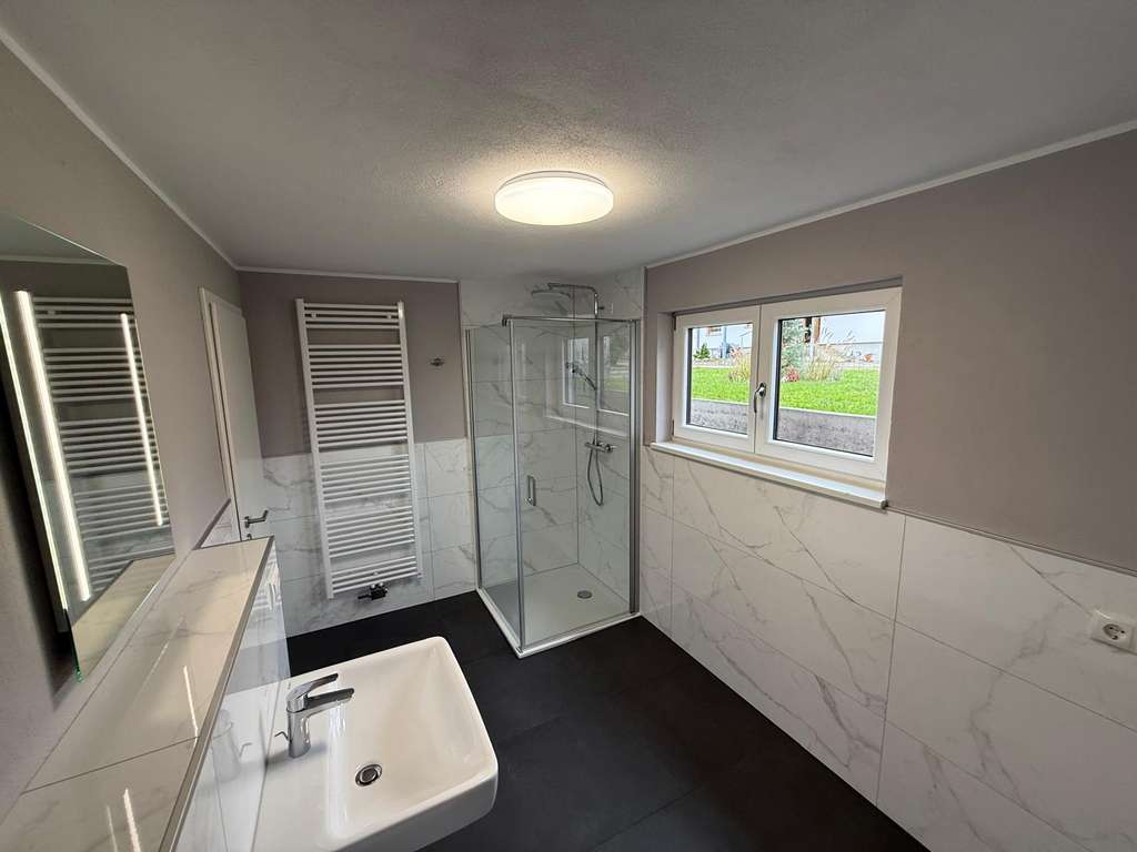 Immobilie in Bruchmühlbach-Miesau - Modernisierter Bungalow mit Garage in sonniger Lage von Bruchmühlbach - Bild 1