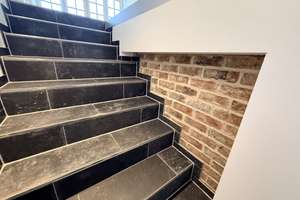 Stilvolle Maisonette-Eigentumswohnung mit großzügiger Dachterrasse in einzigartiger Dorfrandlage