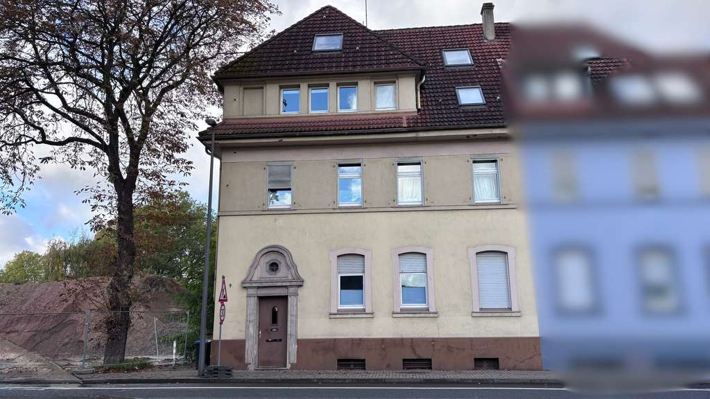 Charmante Dachgeschosswohnung über 2 Ebenen mit Garage und Gartennutzung