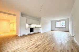 KFW55, exklusive Wohnung mit EBK, großem Balkon, Fernwärme und Tiefgarage