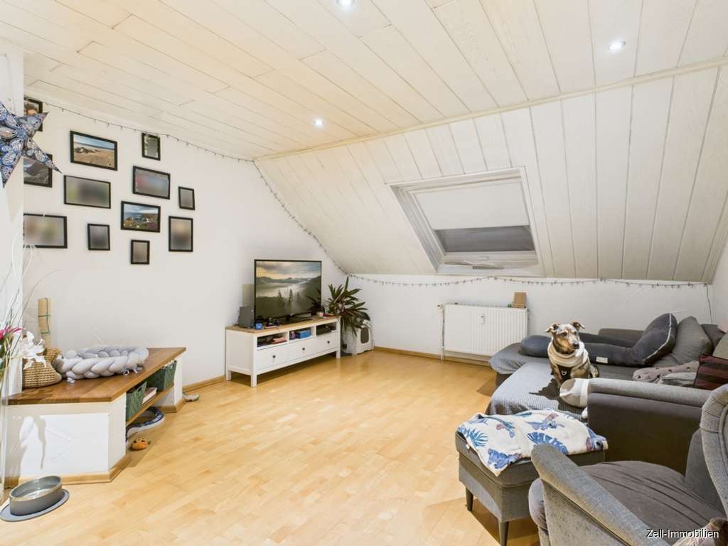 Immobilie in Oestrich-Winkel - Großzügige Dachgeschosswohnung in Oestrich zu verkaufen - Bild 0