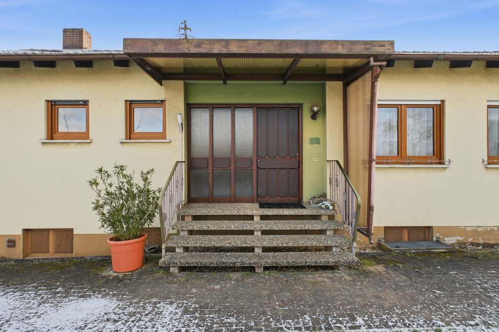 Immobilie in Kapsweyer - Attraktiver und großzügiger Bungalow mit Garten, Garage und Carport in Kapsweyer - Bild 1