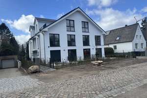 Erstbezug! Hochwertige Maisonette mit Garten in ruhiger Lage