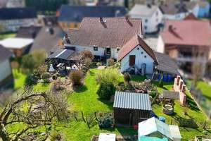 Ihr neues Zuhause: Großzügiges Einfamilienhaus mit idyllischem Gartenparadies – Die vollständige Adresse der Immobilie erhältst du vom Anbieter., 37589 Kalefeld – Vorschaubild 4