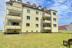 Großzügige Familienwohnung mit Sonnenbalkon und Gartenmitbenutzung