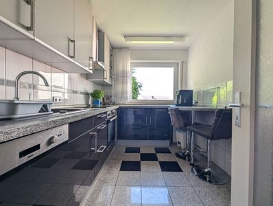 Eben leben im Grünen: 3 Zimmer, Balkon & Garage