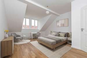 Sanierte 2-Zimmer-Dachgeschosswohnung mit ausgebautem Dachboden