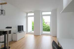 Modern teilmöbliertes Apartment in Bogenhausen