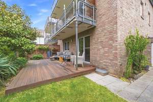 Moderne Erdgeschoss-Wohnung mit Garten, Terrasse & Garage in Seenähe!