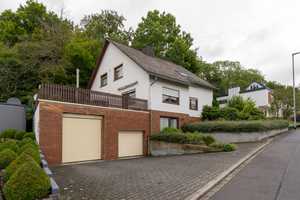 Mehrfamilienhaus mit direktem Blick auf den Wiesensee inklusive Garagen und Terrasse – Westerwaldkreis – Vorschaubild 1