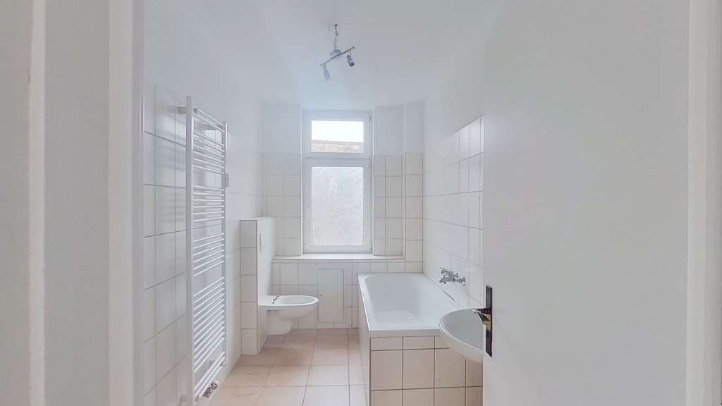 Immobilie in Dessau-Roßlau - Voll vermietetes Mehrfamilienhaus in zentraler Lage von Dessau-Roßlau – stabile Kapitalanlage - 5 WE - Bild 4