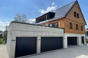 Exklusives Wohnen am Haubenschloß: 2,5-Zimmer-DG mit Loggia und Garage