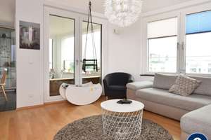AIGNER - Lichtdurchflutete 3-Zimmerwohnung mit Süd-Loggia, offener Küche & TG-Stellplatz