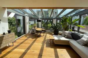 Lichtdurchflutetes Zuhause mit traumhaftem Wintergarten und Gartenidylle