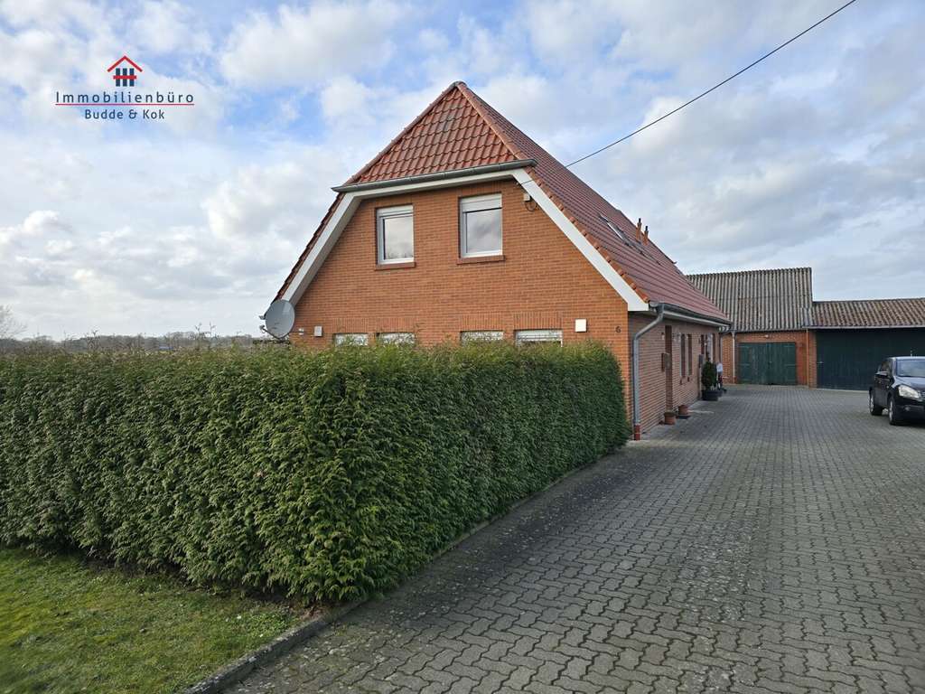 Immobilie in Friesoythe - Mehrfamilienhaus (3 Wohneinheiten) mit großem Grundstück im Außenbereich von Friesoythe - Bild 2