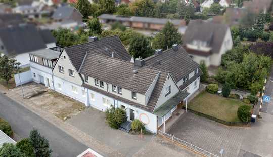 Bild von 5 Parteien Mehrfamilien mit Gewerbeeinheit zu verkaufen