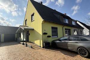 Familienfreundliche Doppelhaushälfte mit Garten, Garage und idealer Raumaufteilung