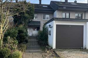Reihenmittelhaus mit Wintergarten, Dachstudio & Garage in TOP Lage