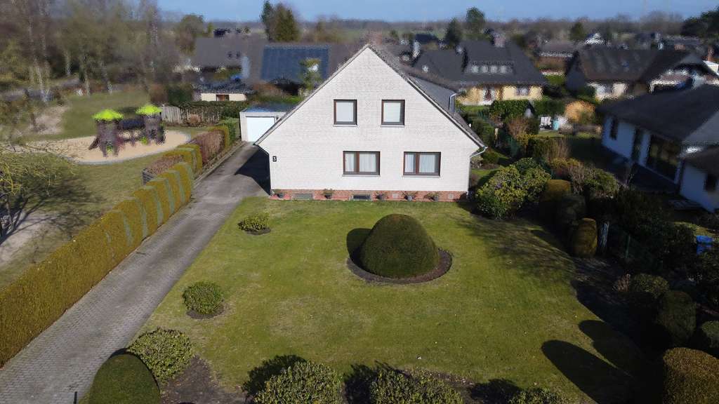 Immobilie in Sottrum - Zweifamilienhaus mit Doppelgarage und Keller im ruhigen Wohngebiet in Sottrum zu verkaufen - Bild 2