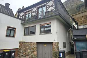 Niederheimbach - Charmantes Reihenhaus im Ortskern mit Garage – Die vollständige Adresse der Immobilie erhältst du vom Anbieter., 55413 Niederheimbach – Vorschaubild 1