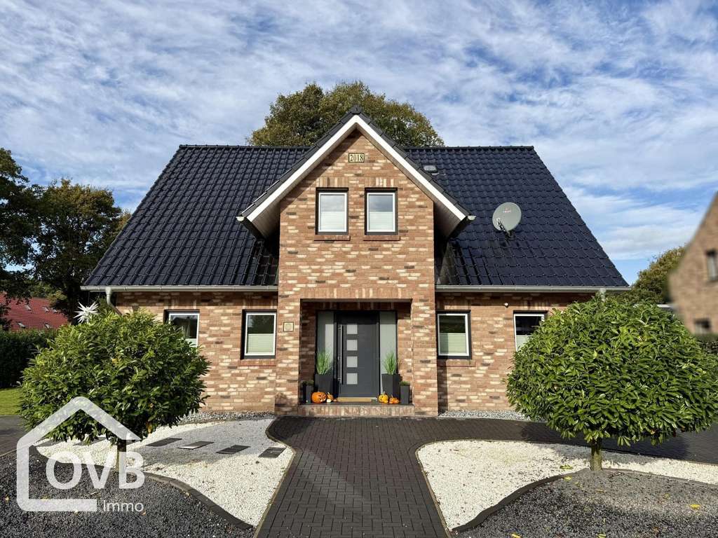 Immobilie in Holtland - Junges, top modernes Einfamilienhaus mit Garage und großzügigem Grundstück - Bild 1