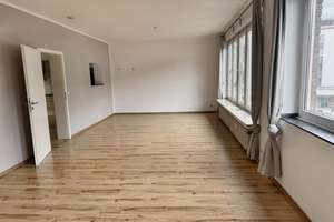 Lichtdurchflutete Maisonettewohnung mit Balkon im beliebten Uerdingen
