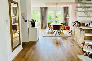 Lichtdurchflutete Maisonette-Wohnung mit 2 Balkonen in Bogenhausen
