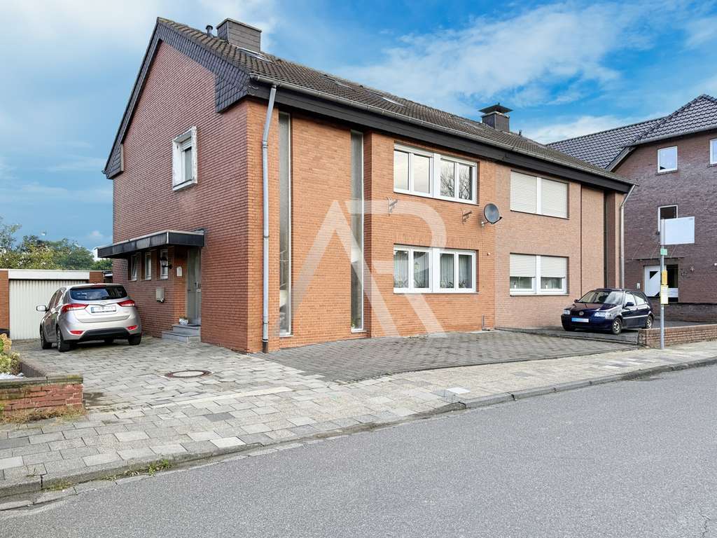 Immobilie in Aldenhoven - Einmalige Gelegenheit! Gepflegtes Ein-/ Zweifamilienhaus mit unverbaubarem Fernblick in Aldenhoven! - Bild 1