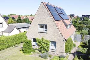 Familienglück in Rostock: Einfamilienhaus mit parkähnlichem Garten, PV-Anlage und modernem Grundriss