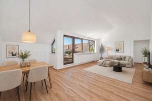 Ganz oben zuhause - Helle 2-Zimmer-Dachgeschosswohnung mit sonniger Süd-Dachterrasse