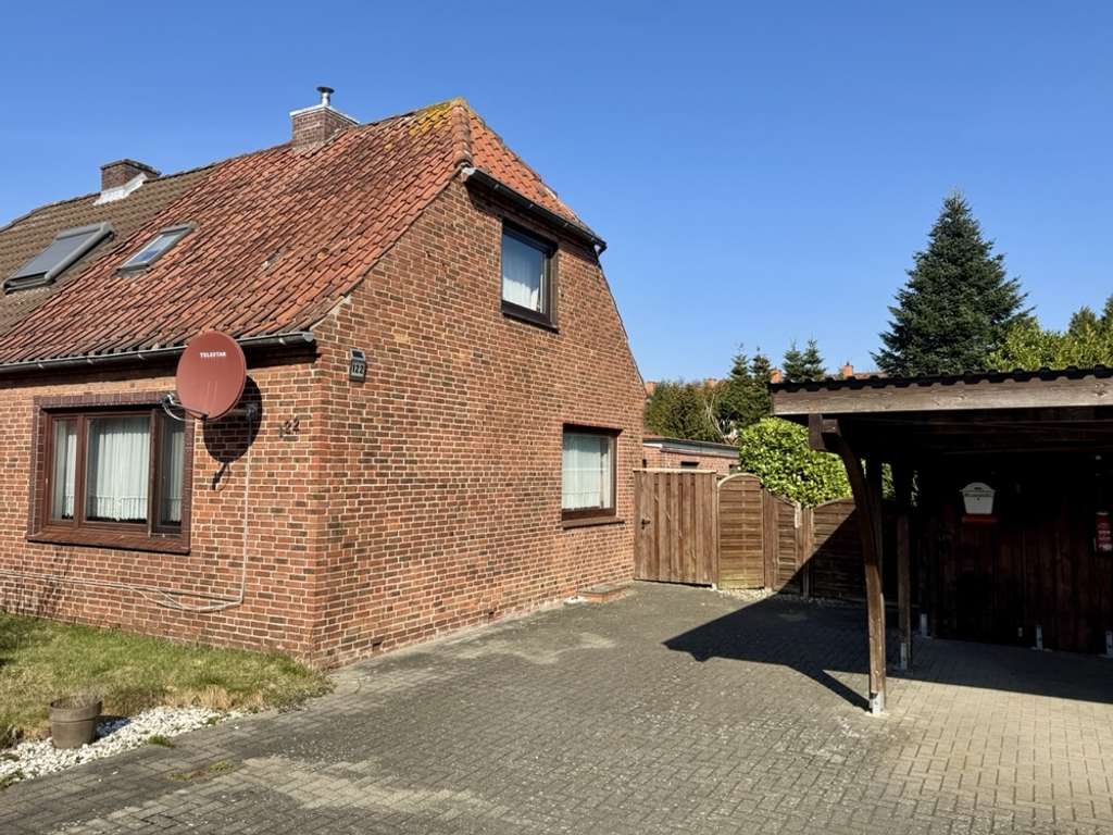 Immobilie in Heide - Verkauf einer Doppelhaushälfte in Heide mit Garten und Doppelcarport - Bild 0
