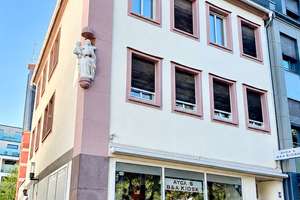 BAYER Immobilien GmbH: Imposantes Wohn- und Geschäftshaus in 1A-Lage am Mainzer Schillerplatz
