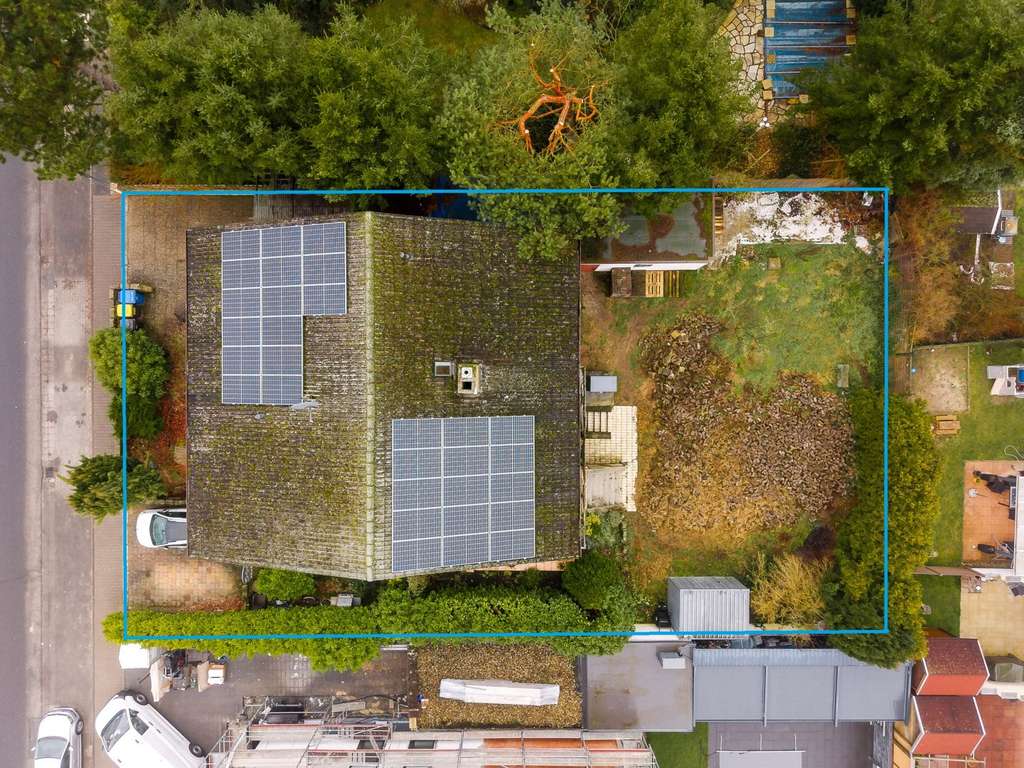 Immobilie in Büttelborn - Eigennutzung oder Kapitalanlage: Zweifamilienhaus mit Garten, Balkon und PV-Anlage in Büttelborn - Bild 1