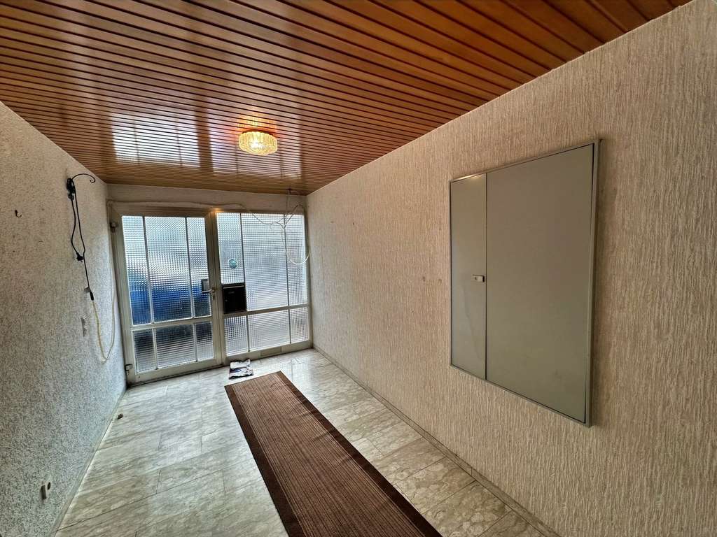 Immobilie in Merchweiler - Solides Reihenmittelhaus mit zwei Garagen  - Bild 4